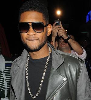 Usher's ex-wife wants singer to cover her legal costs