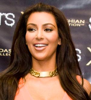 Kim Kardashian tweets and eats with Barack Obama