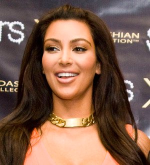 Kim Kardashian tweets and eats with Barack Obama