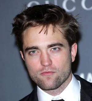 Robert Pattinson and Kristen Stewart put on united front at Twilight premiere