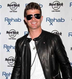 Robin Thicke and Angie Everhart among tourists rescued from hurricane-hit Mexican resort