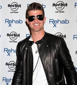 Robin Thicke and Angie Everhart among tourists rescued from hurricane-hit Mexican resort