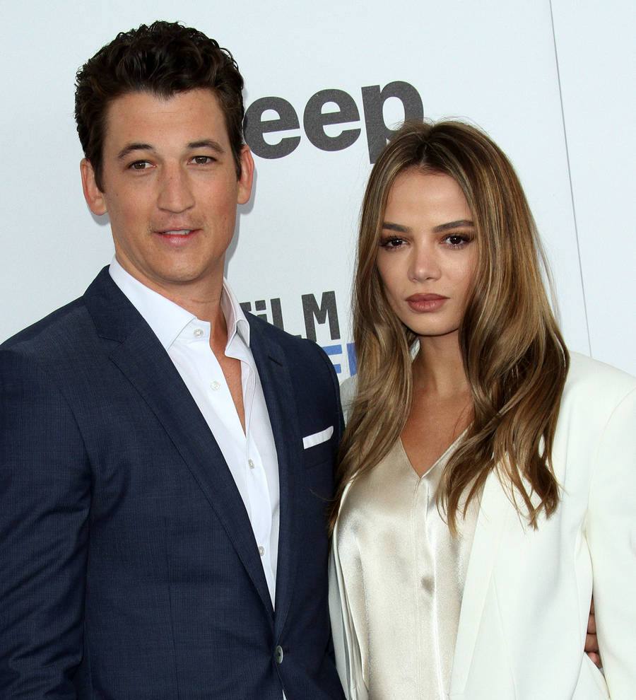 Miles Teller 'pumping the brakes' on wedding plans to enjoy engagement