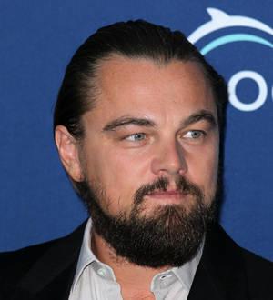 Leonardo DiCaprio walks away from Steve Jobs biopic