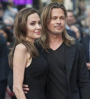 Angelina Jolie and Brad Pitt meet British Foreign Secretary