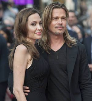 Angelina Jolie and Brad Pitt meet British Foreign Secretary