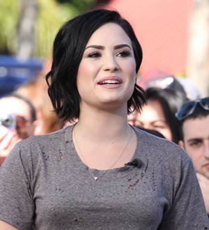 Demi Lovato posts sneaky gym shot of boyfriend online