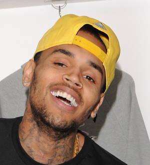 Chris Brown posters defaced in Sweden