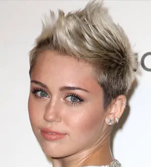 Miley Cyrus shows off engagement ring in new photographs