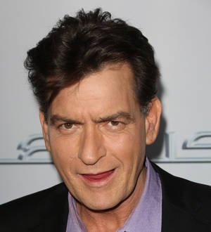 Charlie Sheen swaps ice for cash in bucket challenge