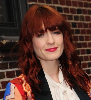 Florence Welch gouges toe during gig