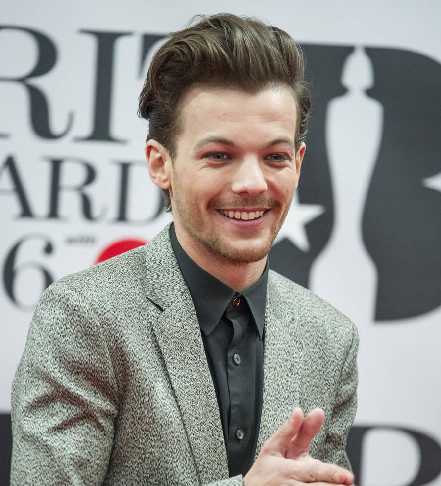 Louis Tomlinson's first stroll with baby Freddie