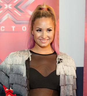 Demi Lovato: 'I'm not dating One Direction's Horan'