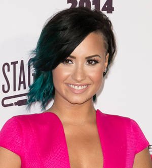 Demi Lovato recruits Sia and Patrick Stump for Charming soundtrack
