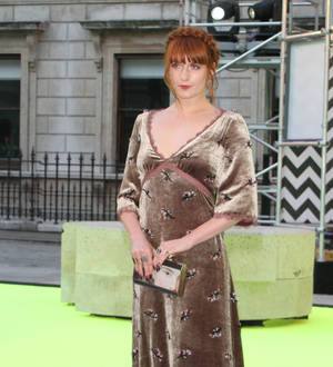 Florence Welch sings for the fashion crowd at charity gala