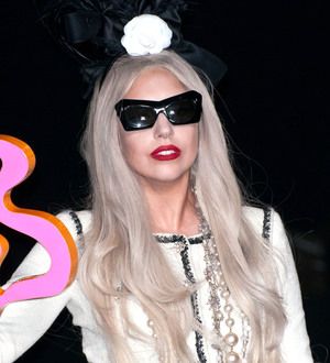 Lady Gaga defies record label with 'weird' outfits