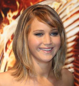 Jennifer Lawrence laughs off 'morning sickness' slip-up