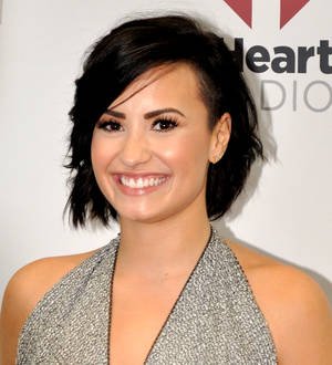 Demi Lovato adds kissing scenes with boyfriend to new video