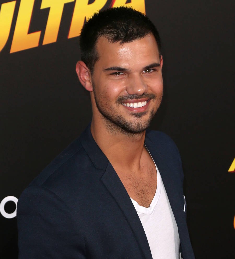 Taylor Lautner performs with bar band