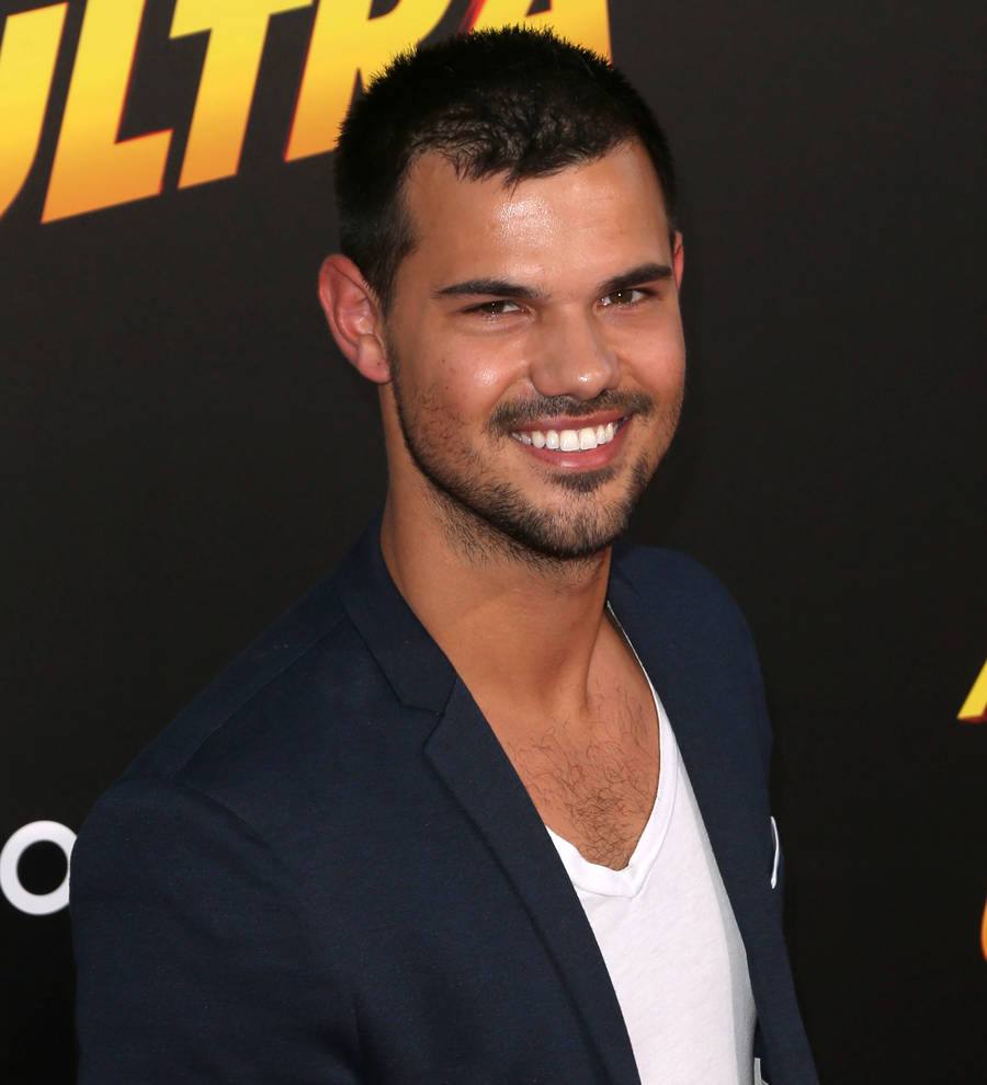 Taylor Lautner performs with bar band