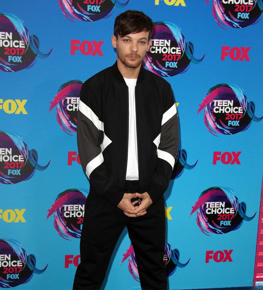 Simon Cowell scolded Louis Tomlinson for drinking before One Direction gig