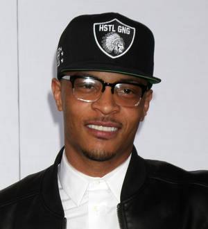 T.I. reschedules restaurant opening