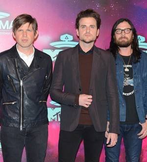 Sun shines for Kings of Leon at rescheduled gig