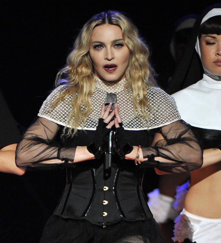 Madonna performs with Nelly Furtado