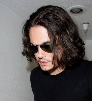 John Mayer undergoes throat surgery