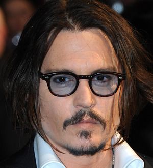 Johnny Depp Still Wearing Pirate Teeth