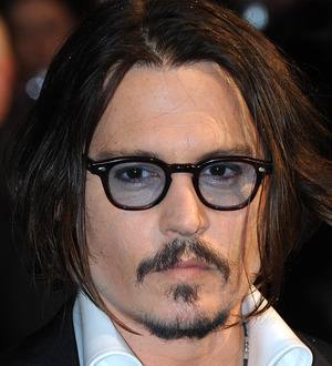 Johnny Depp Still Wearing Pirate Teeth
