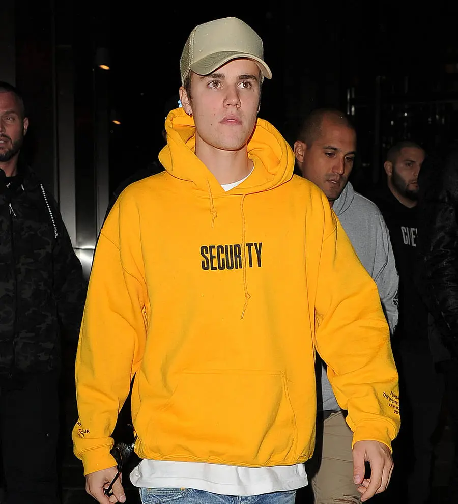 Justin Bieber surprises pupils at London school as he joins in soccer game