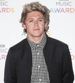 Niall Horan enjoys golf day with Rory McIlroy