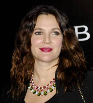 Drew Barrymore tears up in emotional Oprah Winfrey interview
