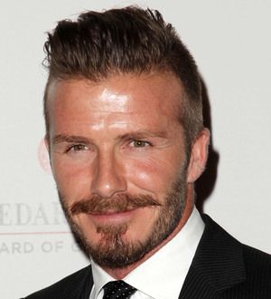 David Beckham's Olympic torch to be sold at auction
