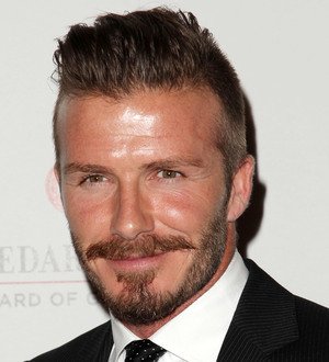 David Beckham's Olympic torch to be sold at auction
