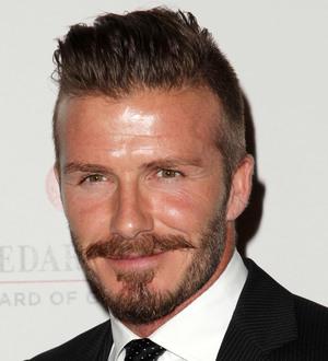 David Beckham's Olympic torch to be sold at auction