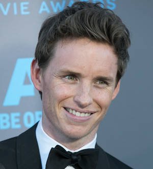 Eddie Redmayne and Hugh Jackman selling hats for charity