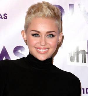 Miley Cyrus goes bra-less for sexy photoshoot