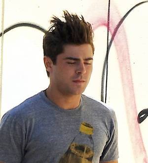 Zac Efron opens up about mystery hand injury