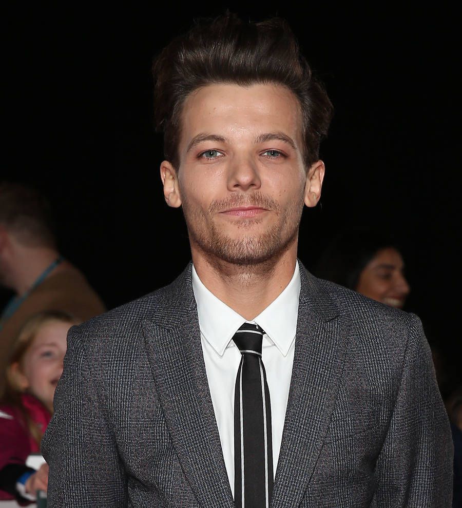 Louis Tomlinson criticizes Justin Bieber for canceling his tour