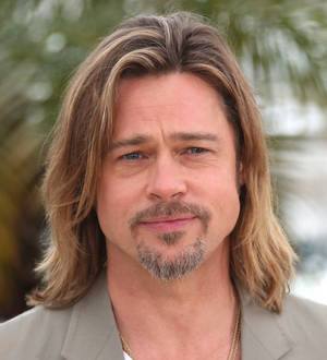 Brad Pitt surprises fans at movie screening