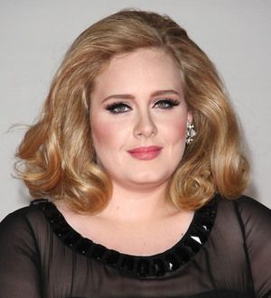 Adele steps out with new baby