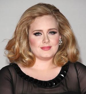Adele steps out with new baby