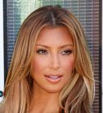 Kardashian Lands Deal with 50 Cent's Fragrance Company