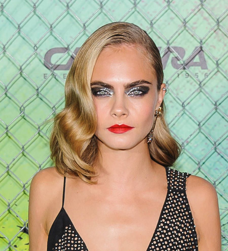Cara Delevingne raised to keep 'weak' emotions under wraps