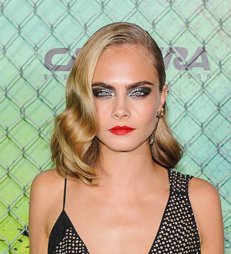 Cara Delevingne raised to keep 'weak' emotions under wraps
