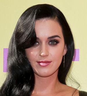 Katy Perry kisses fan during Singapore show