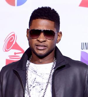 Usher's former stepson is laid to rest