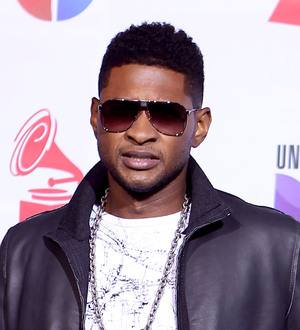 Usher's former stepson is laid to rest